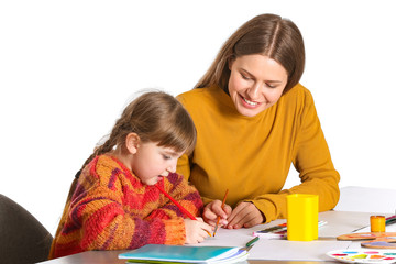 Drawing teacher giving private art lessons to little girl on white background