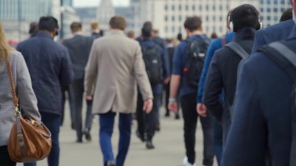 Crowd of pedestrian commuters in London on cool morning in slow motion. Clip 31