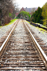 Fototapeta na wymiar Railroad tracks diverging into the distance.