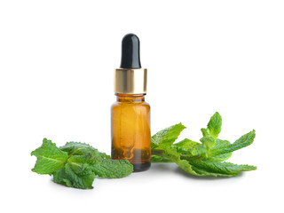 Bottle of mint essential oil on white background
