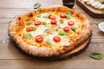 Delicious pizza Margherita on table