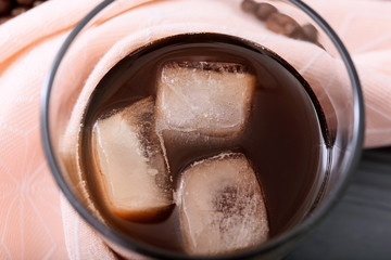 Glass of tasty iced coffee, closeup