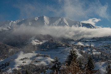 Fototapeta na wymiar montagtna village after snowfall