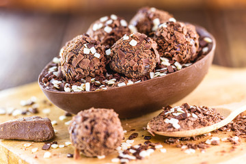 brazilian easter egg. Easter with refined chocolate, covered with brigadeiro sweets. Black and white chocolate.