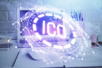 Multi exposure of blockchain and crypto economy theme hologram and table with computer background. Concept of bitcoin cryptocurrency.