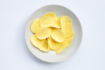 Potato chips on white background.