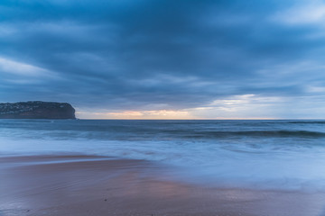 Sunrise Seascape and Rain Clouds