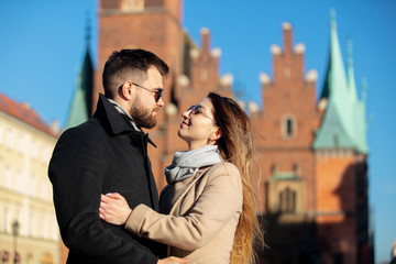 Fototapeta na wymiar young couple on a city street in Wroclaw, Poland