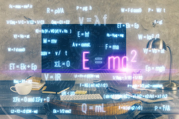Desktop computer background and formula hologram writing. Double exposure. Education concept.
