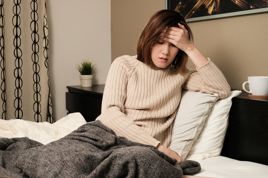 asian woman sneezing, fever, headache  and self quarantine at home .the infection from germ, bacteria, covid19, corona , sars , influenza virus on white background. Sick and illness concept