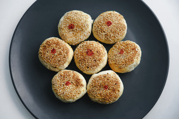 Chinese traditional food sesame baked wheaten cake. Chinese traditional gourmet sesame baked wheaten cake.