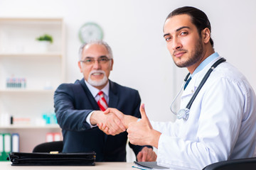 Male doctor and businessman discussing medical project