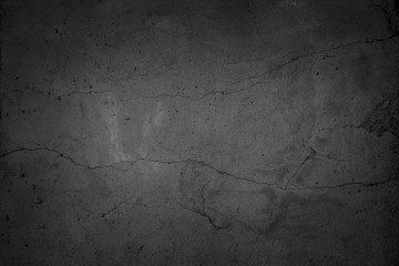 Art black concrete stone texture for background in black. Abstract color dry scratched surface wall...