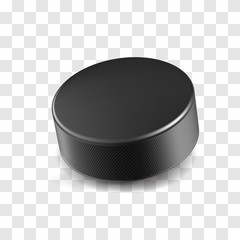 Realistic black rubber hockey puck isolated on transparent background. Ice hockey competition and design element for tournament banner. Sports equipment for team game on stadium vector illustration. - obrazy, fototapety, plakaty
