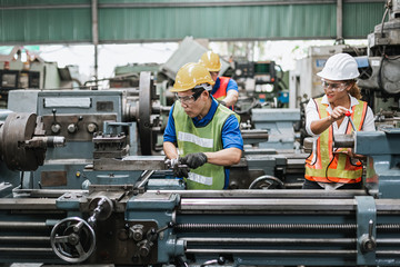 Teamwork professional engineer work heavy industry in factory.