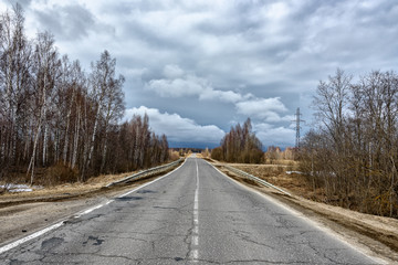 Suburban road is going into the distance