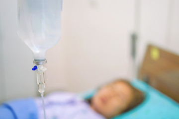 Normal saline solution or sodium chloride with infusion bottle drip for patient in hospital