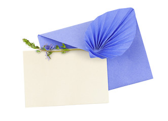 Purple craft paper envelope with draped element, wild flower and empty card for text