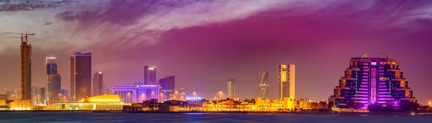Foto op Aluminium Beautiful view of Manama city skyline with dramatic clouds after sunset, Manama, Kingdom of Bahrain. © Preju