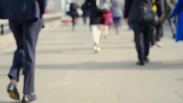 Crowd of pedestrian commuters in London on cool morning in slow motion. Clip 47a