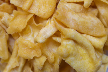 Close view of papdi gathiya which is a popular indian savoury. Indian sweet and savoury prepared during festivals.