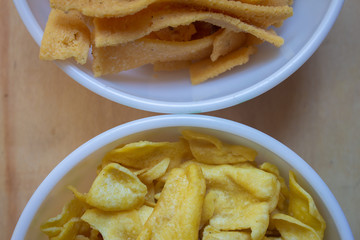 Close view of papdi gathiya and ribbon pakoda which are popular indian savoury. Indian sweet and savoury prepared during festivals.