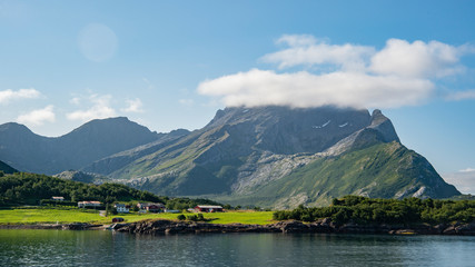 Mountain and village view from ferry boat in Norway