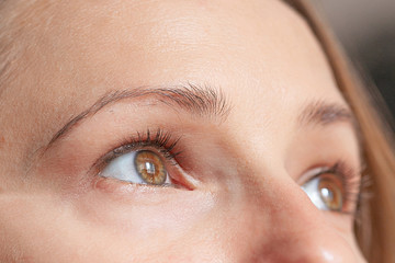 Fototapeta premium eyes and face. eyebrow and eyelash growth. before and after.