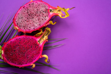 Dragon fruit isolated on violet background
