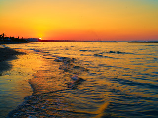 Fototapeta na wymiar Sunrise on the sea coast shooting along the coast in Larnaca Cyprus Greece Mediterranean Sea