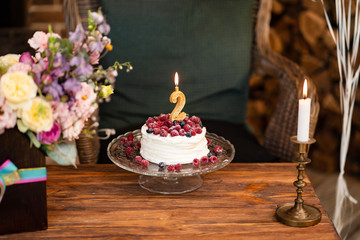 birthday cake berries and candle second birthday