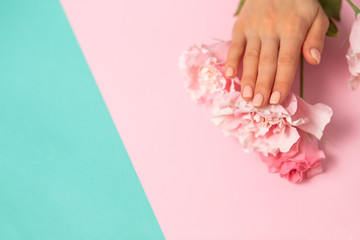 Pink rose with hands on background