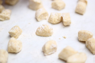 Gnocchi being prepared. Small soft dough dumplings with cheese.