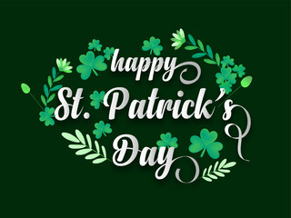 Calligraphy on St. patrick's day greeting card with clover leafs and branches.