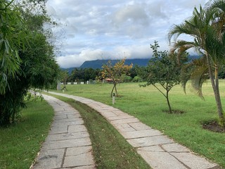 Pathway with Cloud over Hills