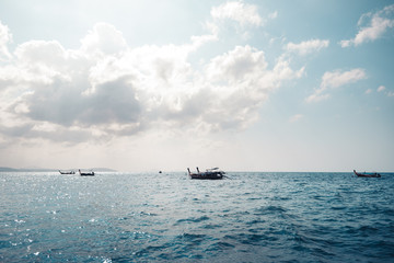 Blue sea and rocky mountains, evening bay in Krabi