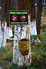 Garbage cans in a forested area. Recycling bin in park for protect environment. Pollution free environment Thames.
