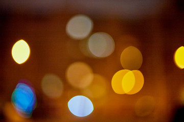 Abstract texture with light bokeh and black background