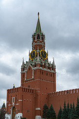 Fototapeta na wymiar Spasskaya tower in Moscow on Red Square in cloudy weather