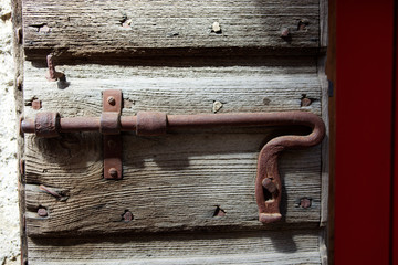 Scansano (GR), Italy - June 10, 2017: A rusty old unused bolt in Scansano, Grosseto, Tuscany, Italy