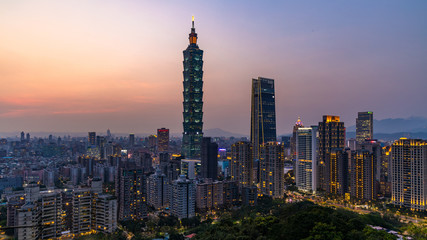 Fototapeta na wymiar Taiwan city skyline at twilight , The beautiful sunset of Taipei, Taiwan city skyline and skyscraper, Skyscraper and other modern building of downtown, Taipei popular tourist destination.