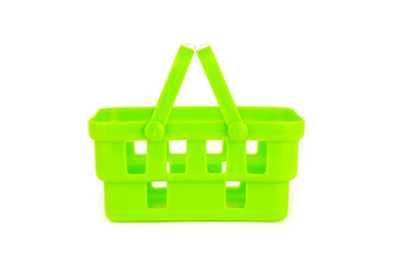 Green plastic shopping basket isolated on white background, toys for kids