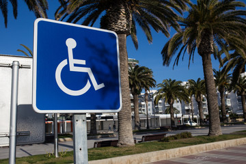 Sign for disabled parking close-up. A clear sunny day.