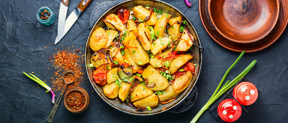 Roasted potato in a frying pan