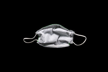 Medical mask for Medical protective mask isolated on black background. Mask for cover the mouth and nose to protection. Concept of Healthcare and medical