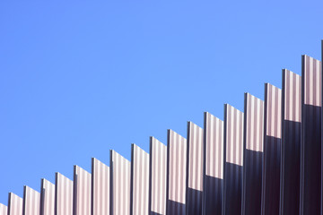 abstract curved lines against the sky