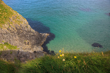 Ballintoy (Ireland), - July 25, 2016: Coastal scenery near Carrick a Rede along the causeway coast,...