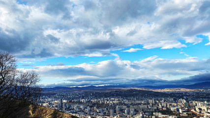 TBILISI, GEORGIA  DECEMBER 14, 2019:  Beautiful aerial view of the central part of city    and blue sky in Tbilisi, Georgia © Victoria Key