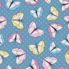 Colorful butterfly seamless pattern on blue polka dots background