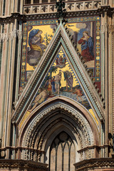 Orvieto (TR), Italy - May 10, 2016: A particular of Orvieto cathedral facade, Terni, Umbria, Italy